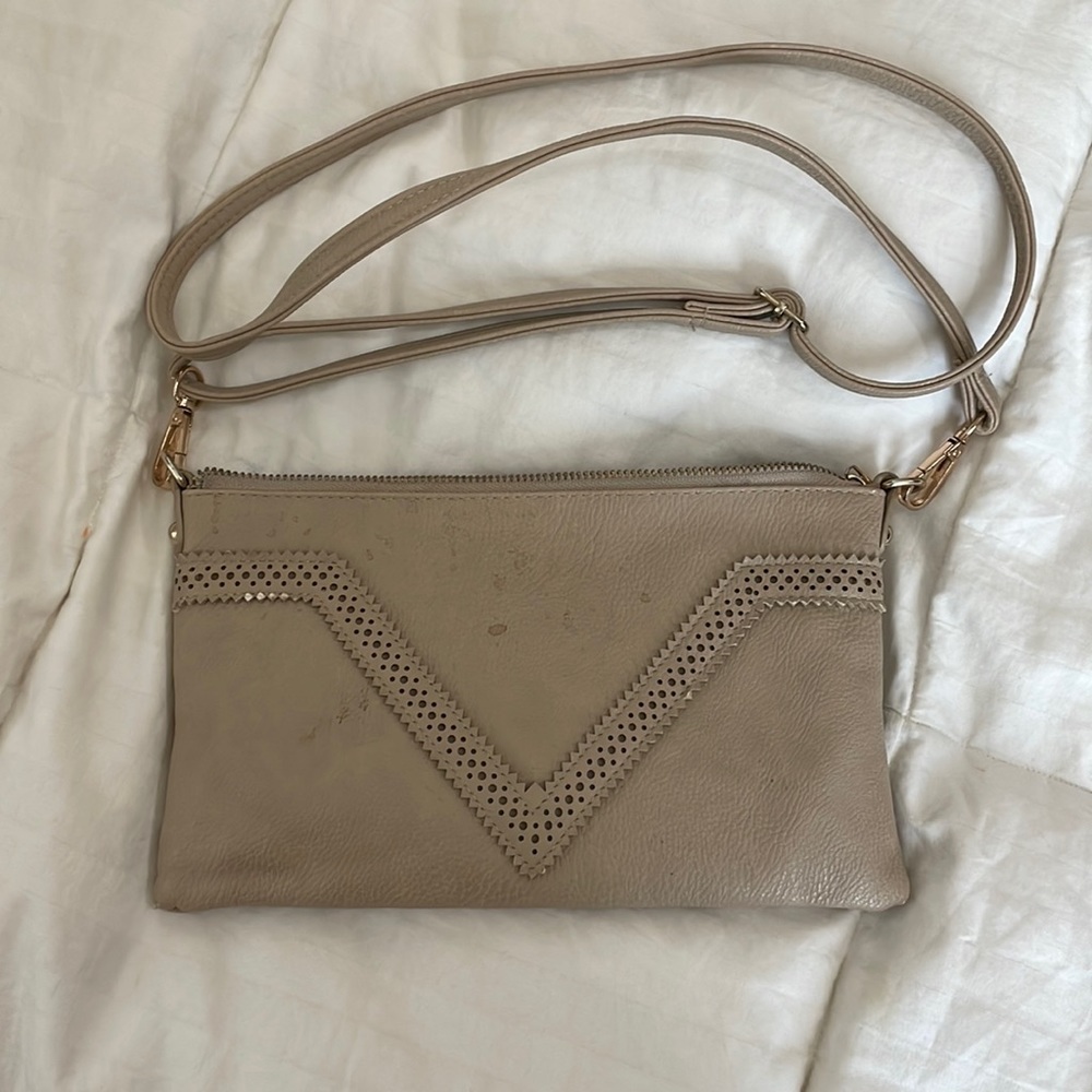 Boutique purse. Outside Needs cleaned.